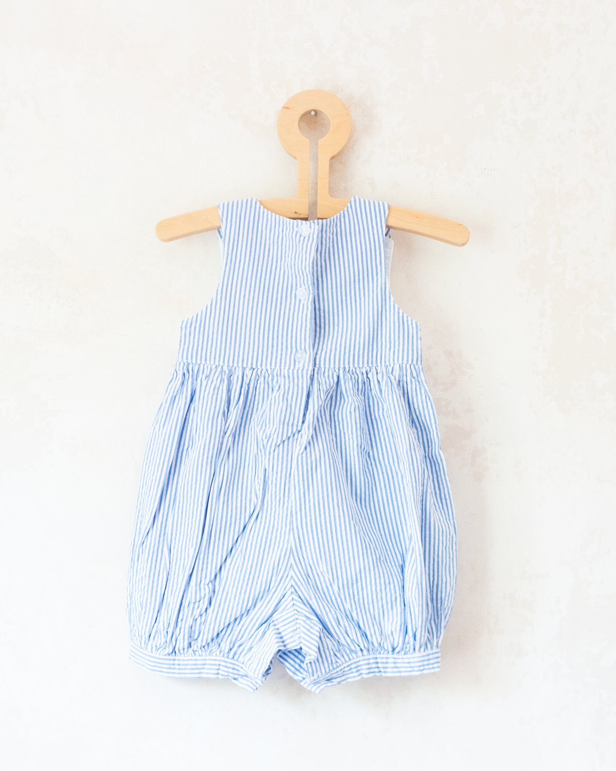 Striped romper with embroidered boats | 3-6 months