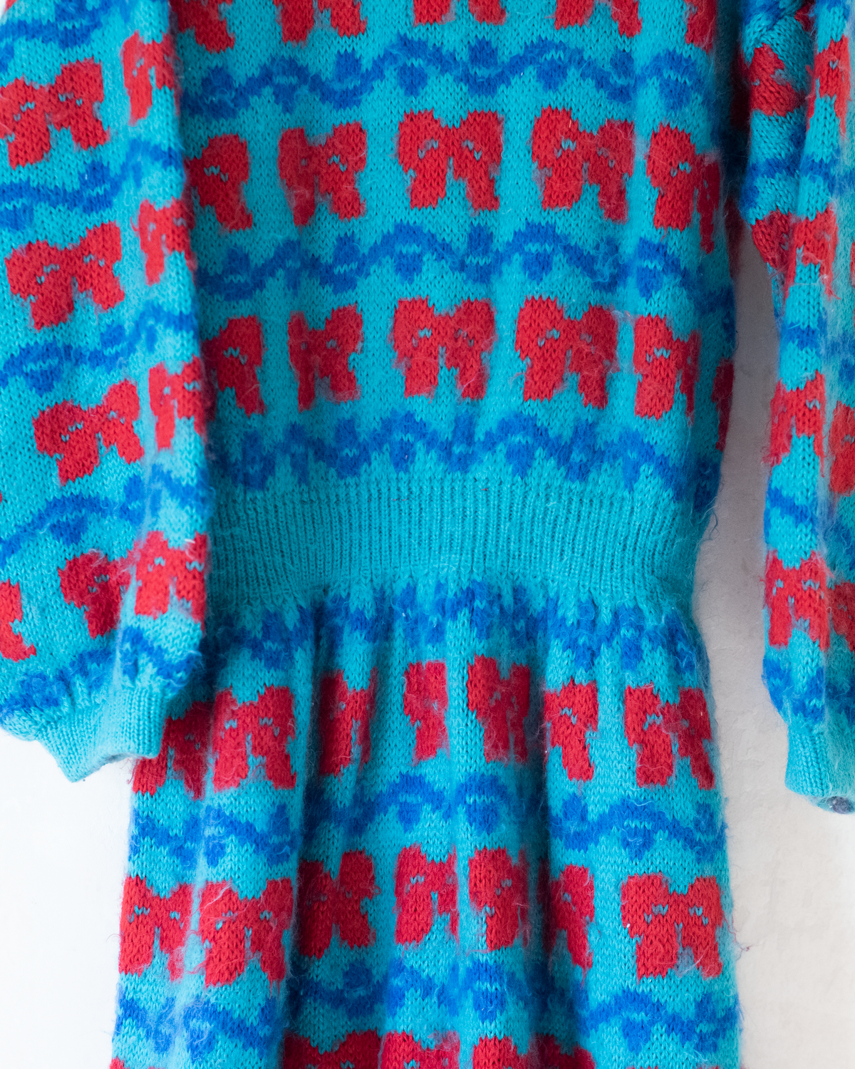 Knitted wool dress with bow ties | 9-10 years