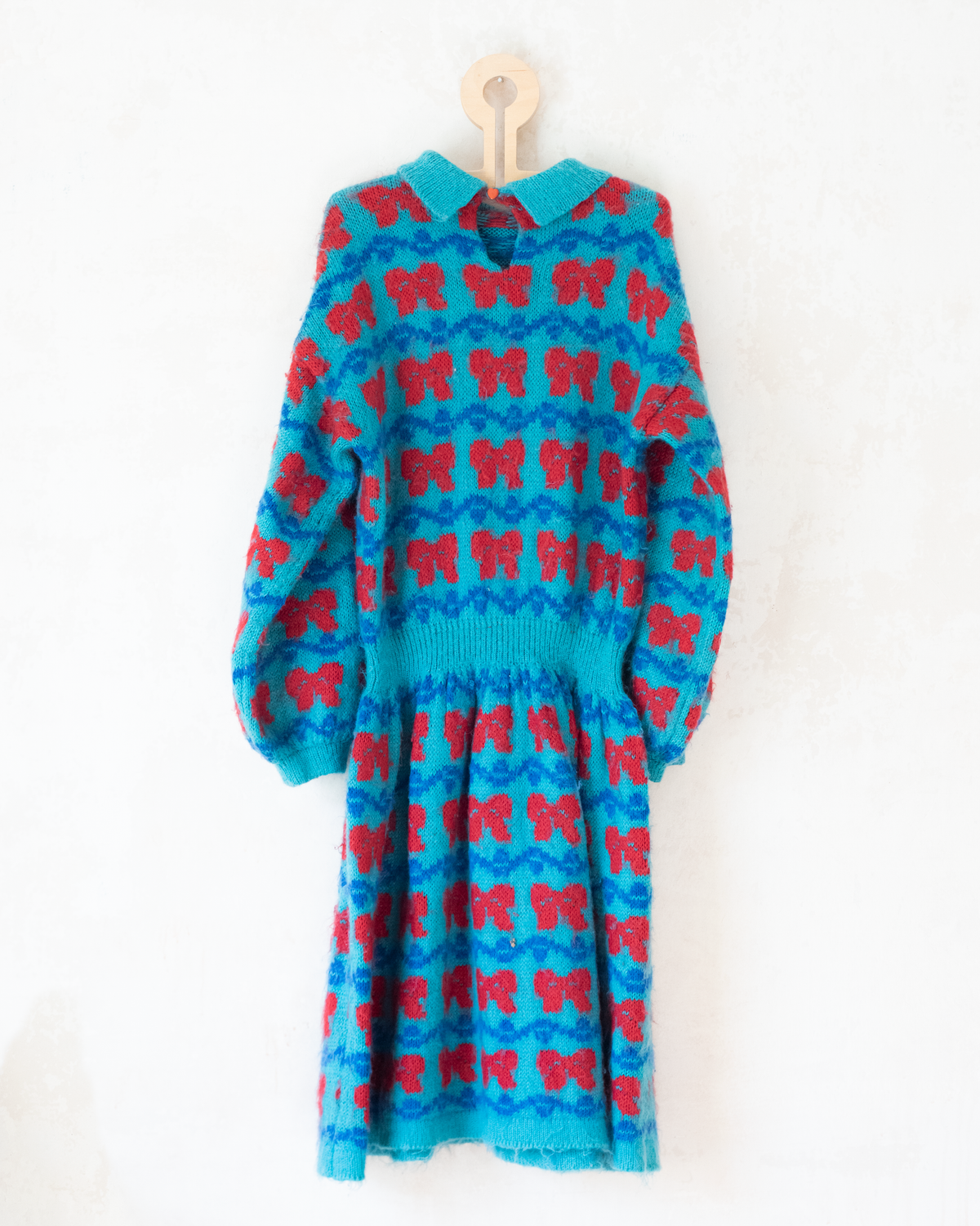 Knitted wool dress with bow ties | 9-10 years