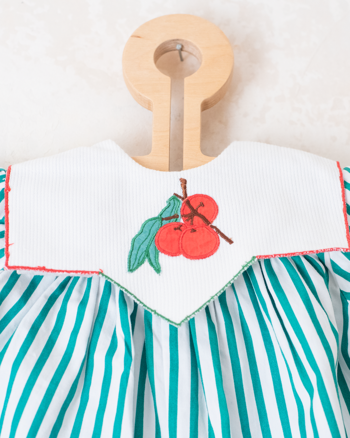 Striped and embroidered berry jumpsuit | 3-6 months