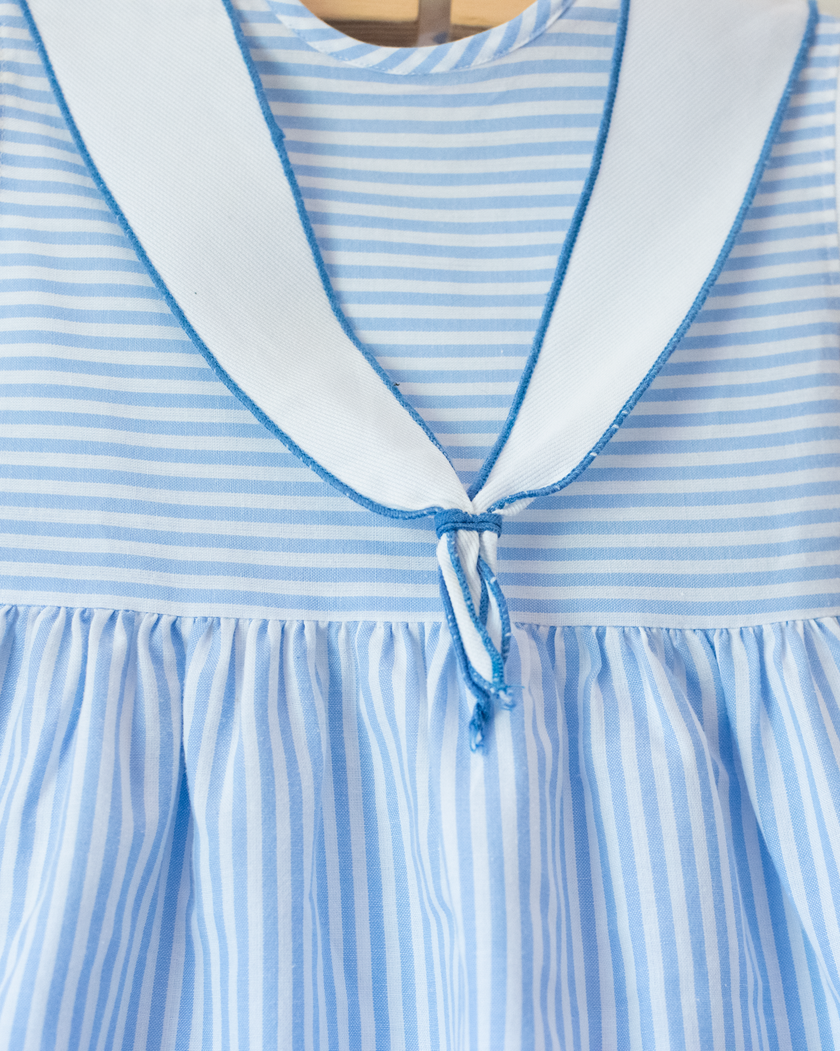 Striped dress with embroidered sailboat | 2-3 years