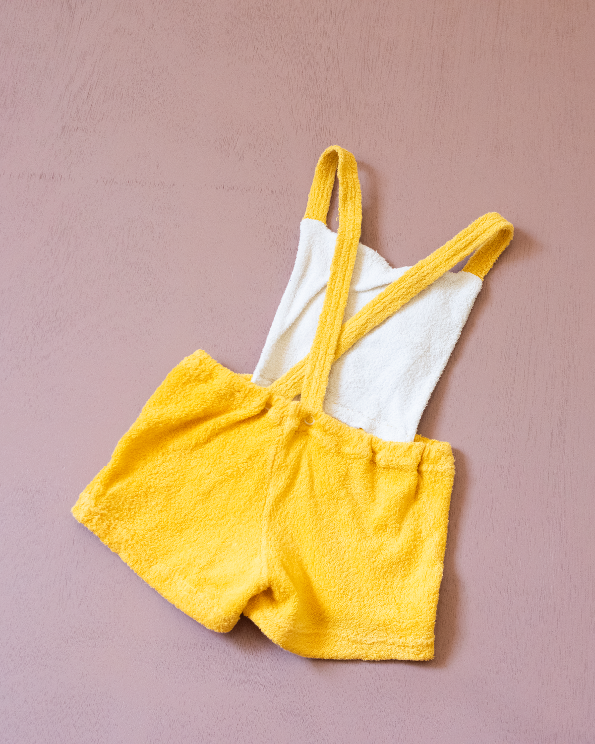 Yellow terry cloth romper with a sailboat | 9-12 months
