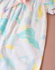 אוברול בצבעי פסטל עם הדפס עצים ובובה על חוט | 18-24 חודשים
