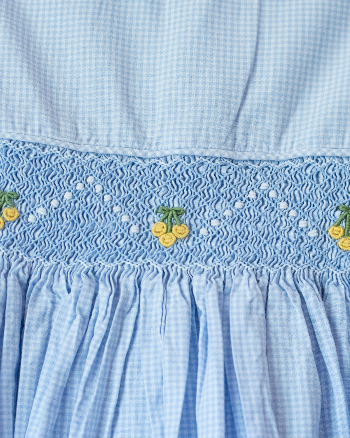 Checked dress with smock embroidery and yellow cherries | 4-5 years