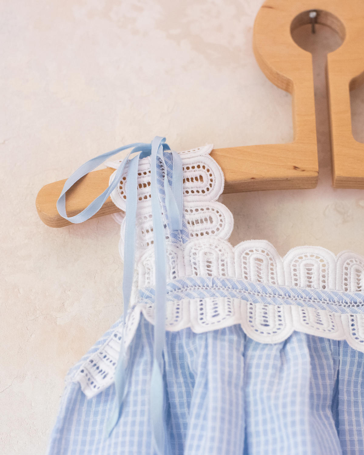 Light blue plaid dress with white lace and ribbons | 12-18 months