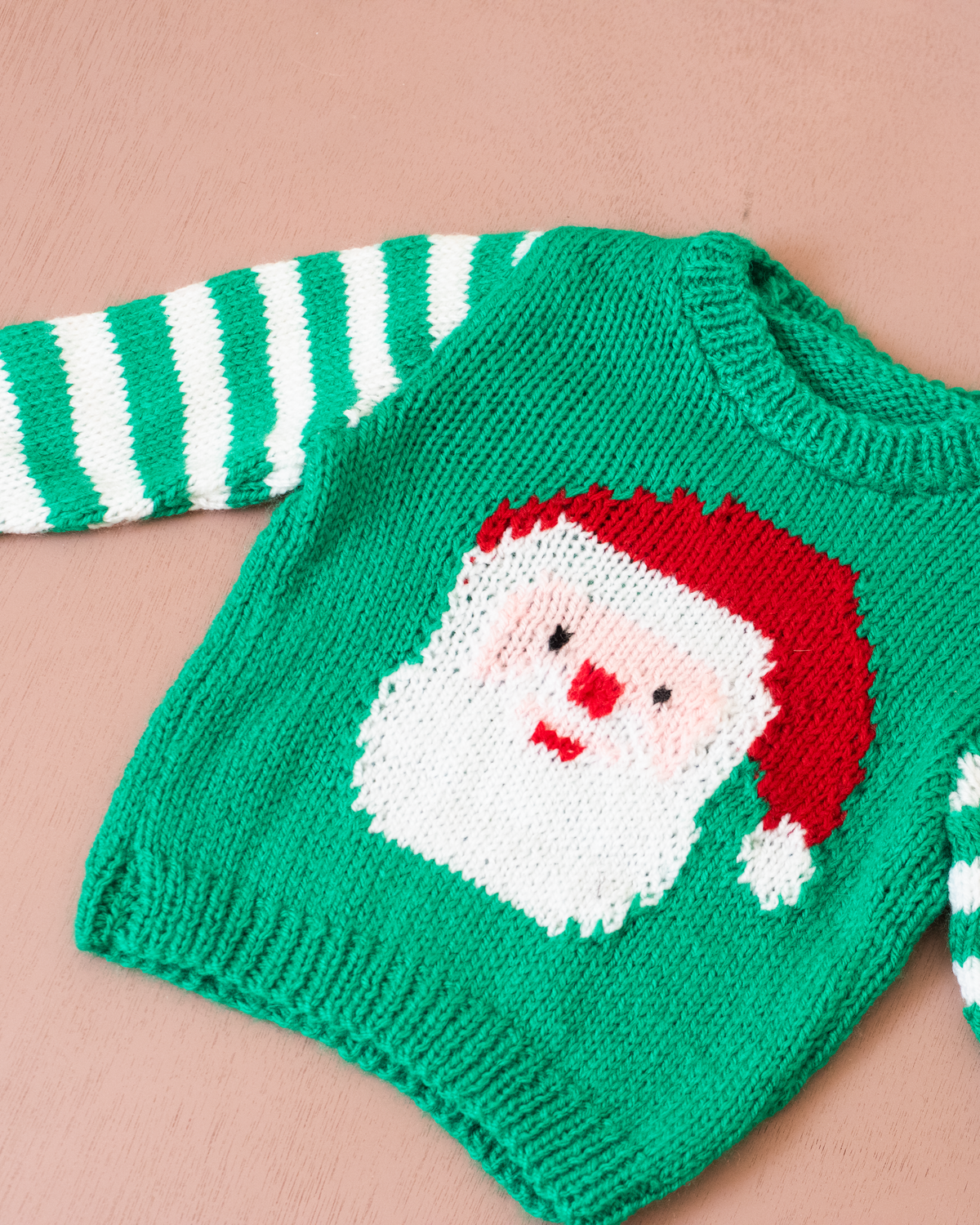 Green sweater with stripes and Santa Claus | 12-18 months