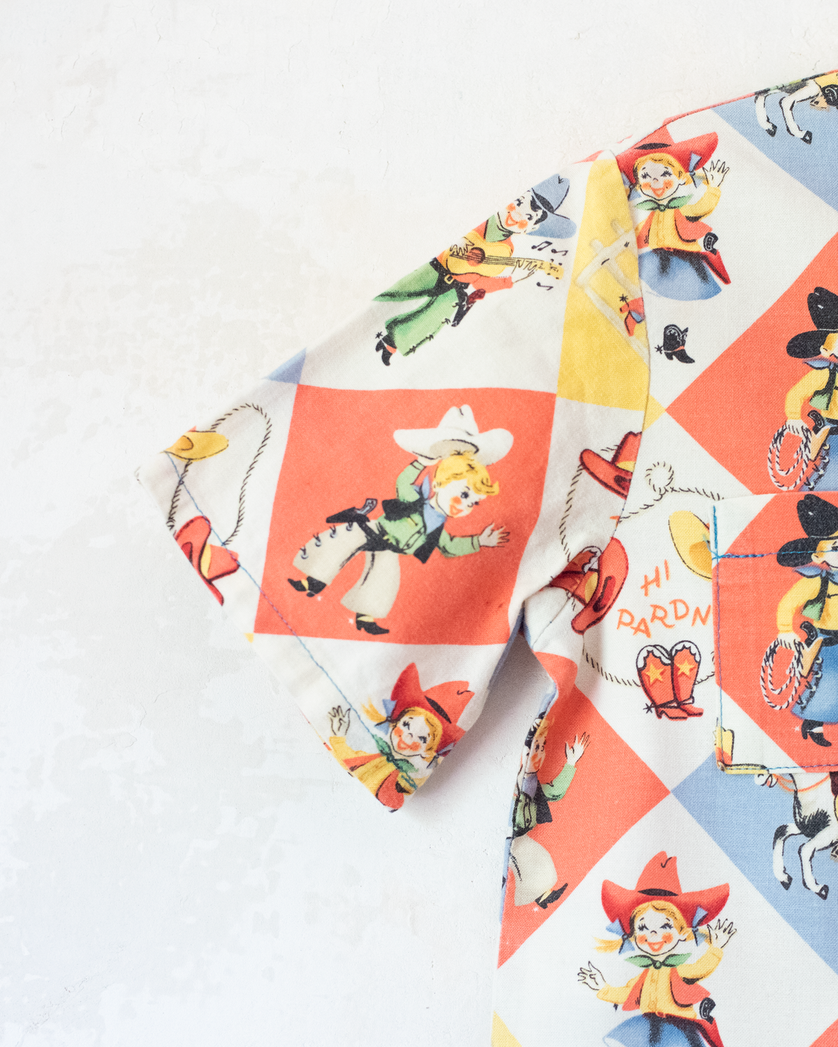 Colorful button-up shirt with cowboys | 5-6 years