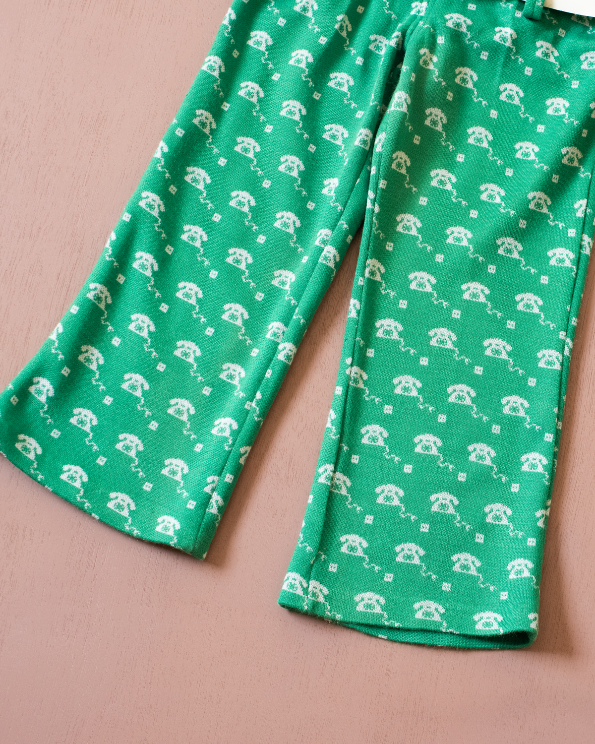 Green 70s jumpsuit with a rotary phone | 3-4 years