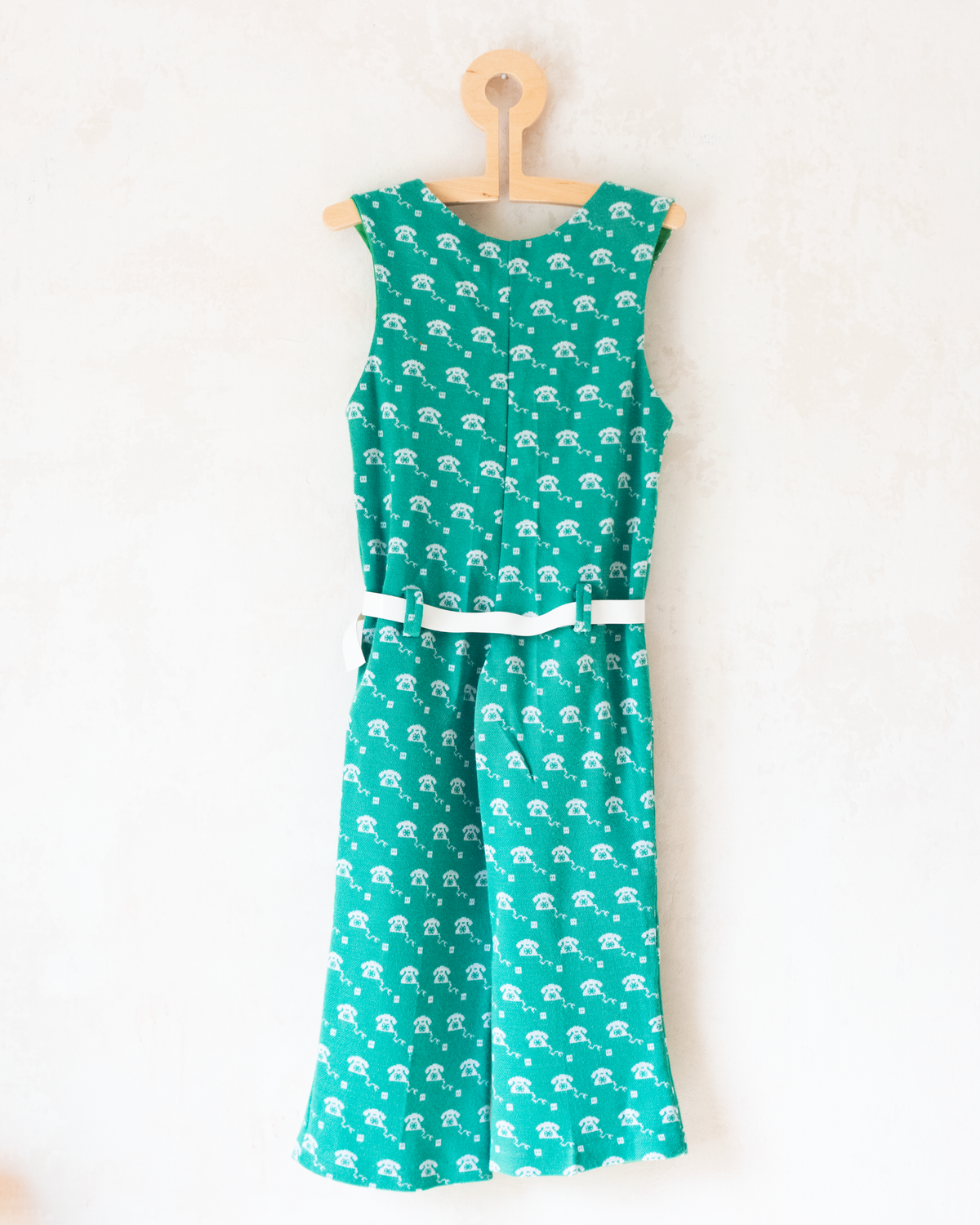 Green 70s jumpsuit with a rotary phone | 3-4 years
