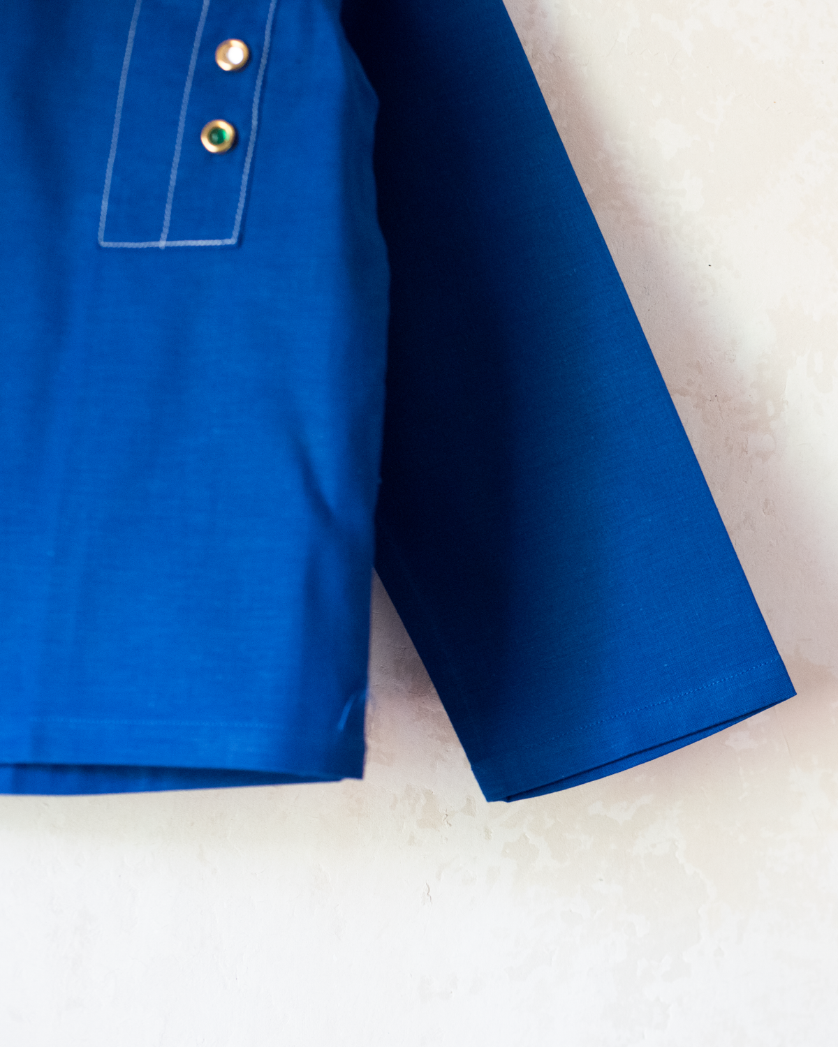 Blue shirt with embroidery of a boy riding a bicycle | French dead stock from the seventies | 4-5 years