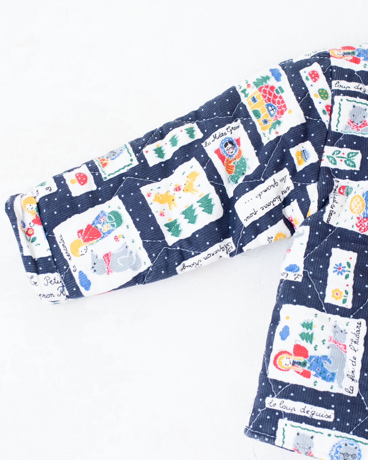 Blue top with nostalgic prints and bow tie | 9-12 months