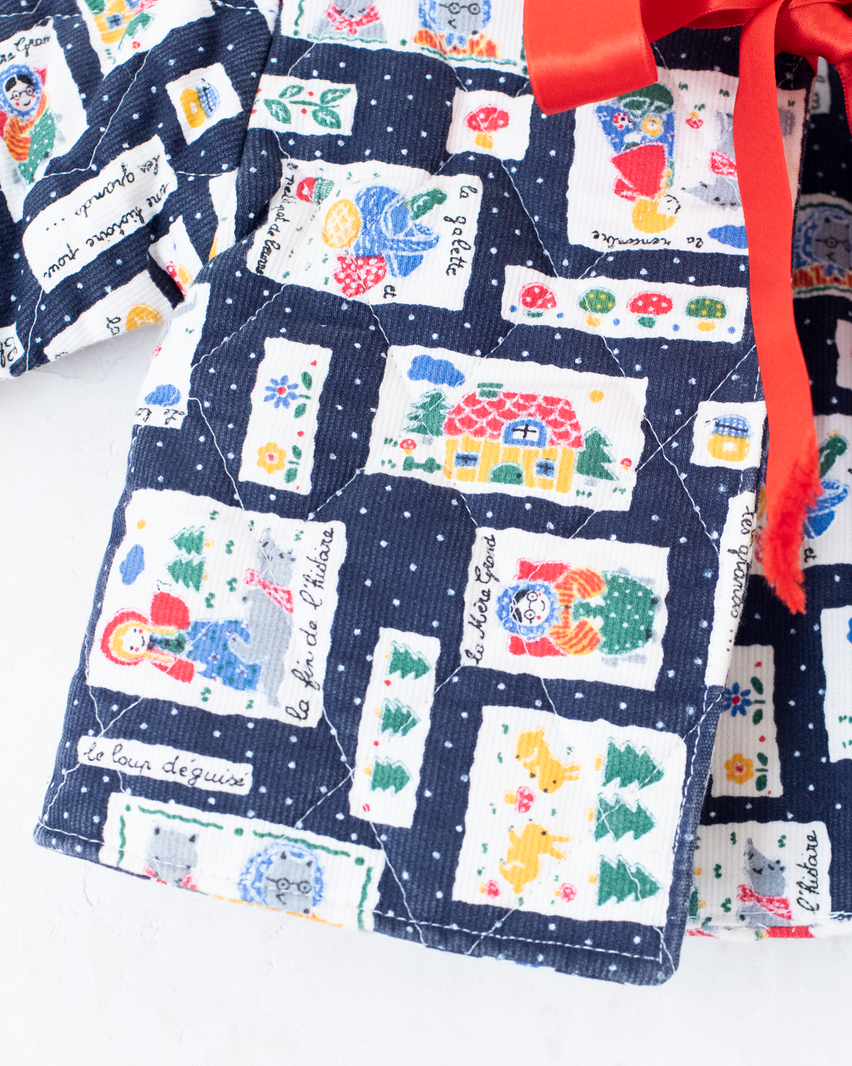 Blue top with nostalgic prints and bow tie | 9-12 months