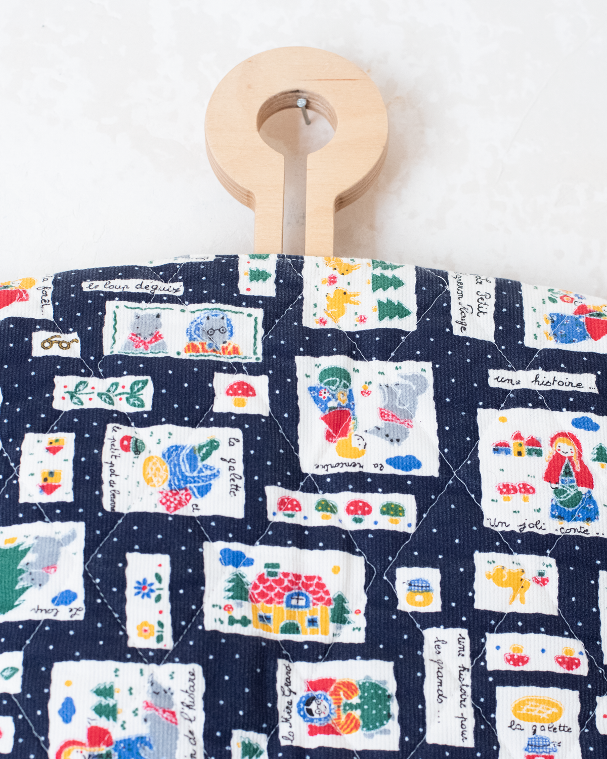 Blue top with nostalgic prints and bow tie | 9-12 months