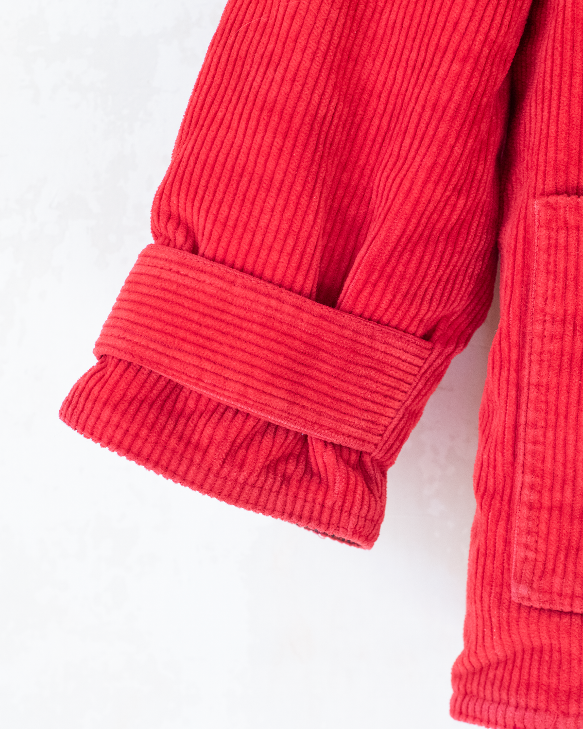 Red corduroy coat from Yves Saint Laurent | 10-11 years