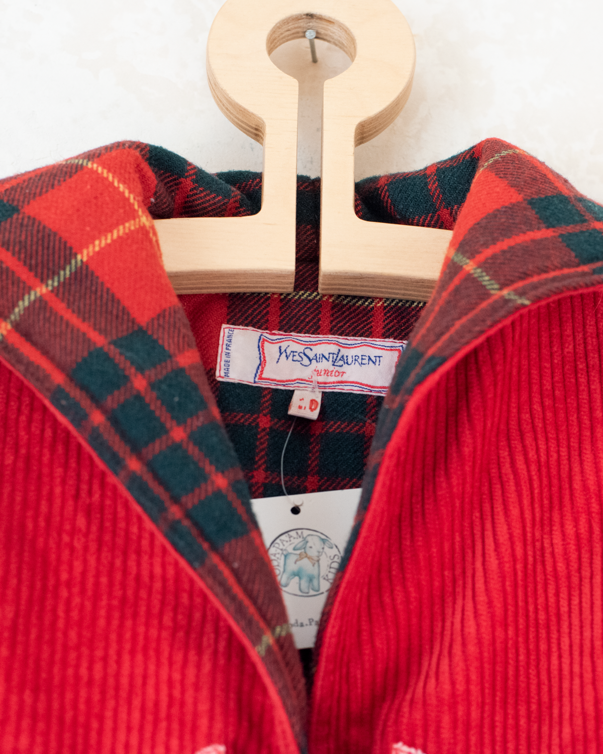 Red corduroy coat from Yves Saint Laurent | 10-11 years