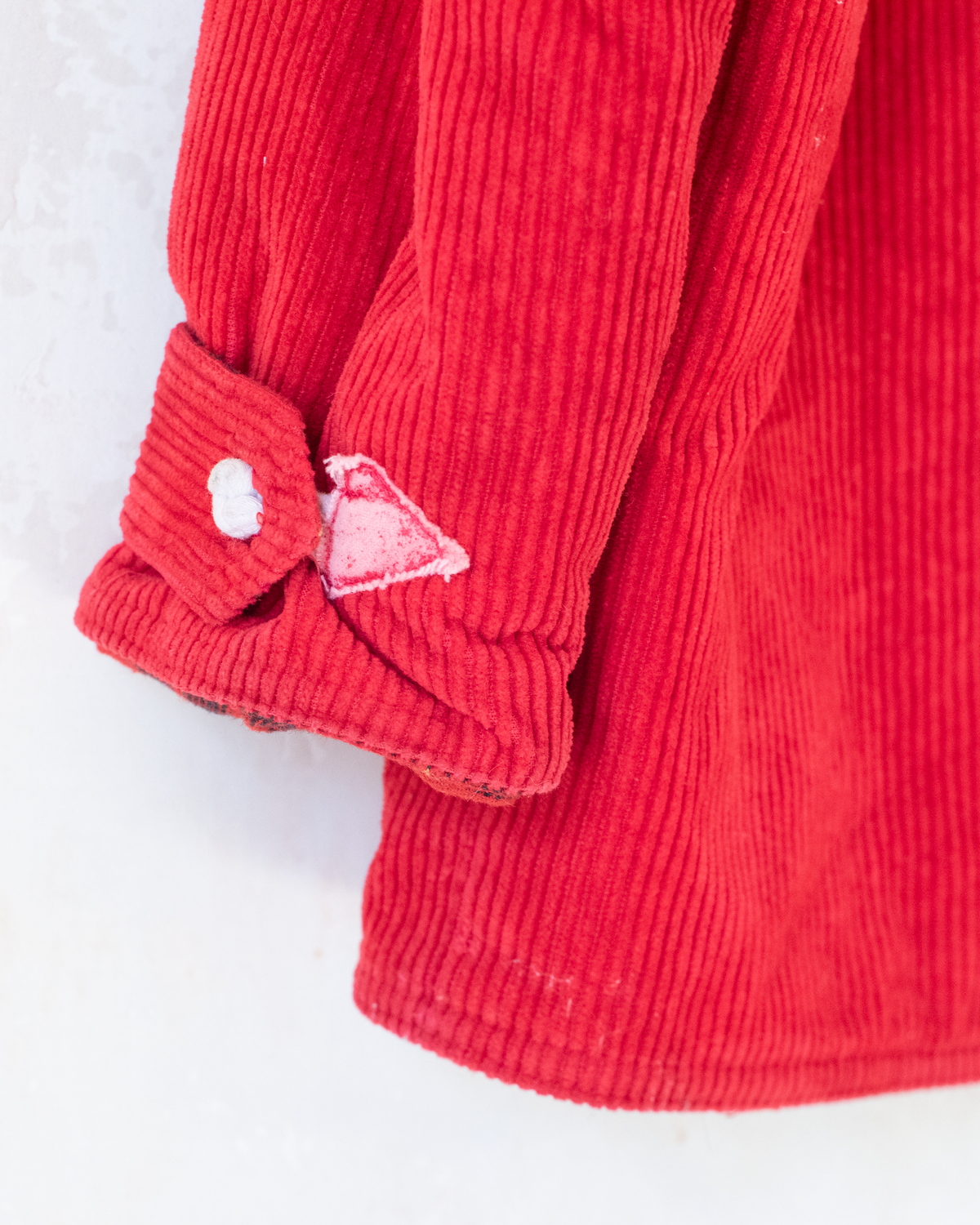 Red corduroy coat from Yves Saint Laurent | 10-11 years