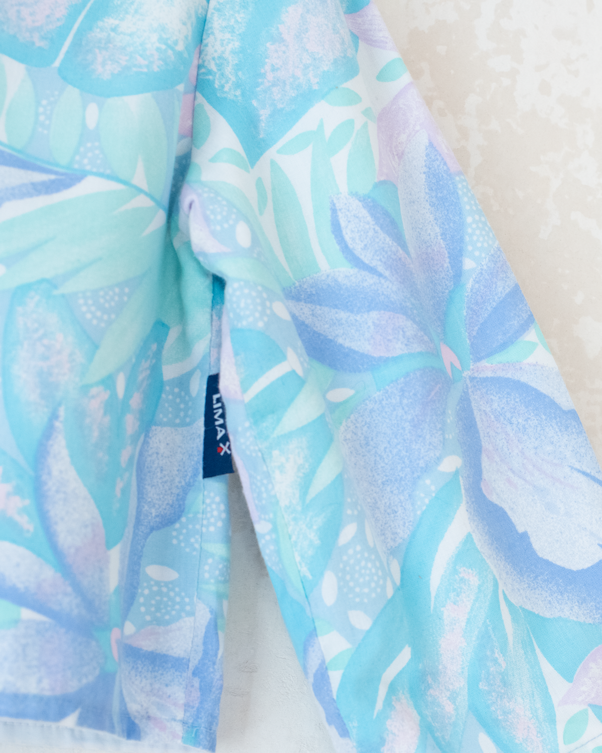 Thin top with pastel flowers | 2-3 years