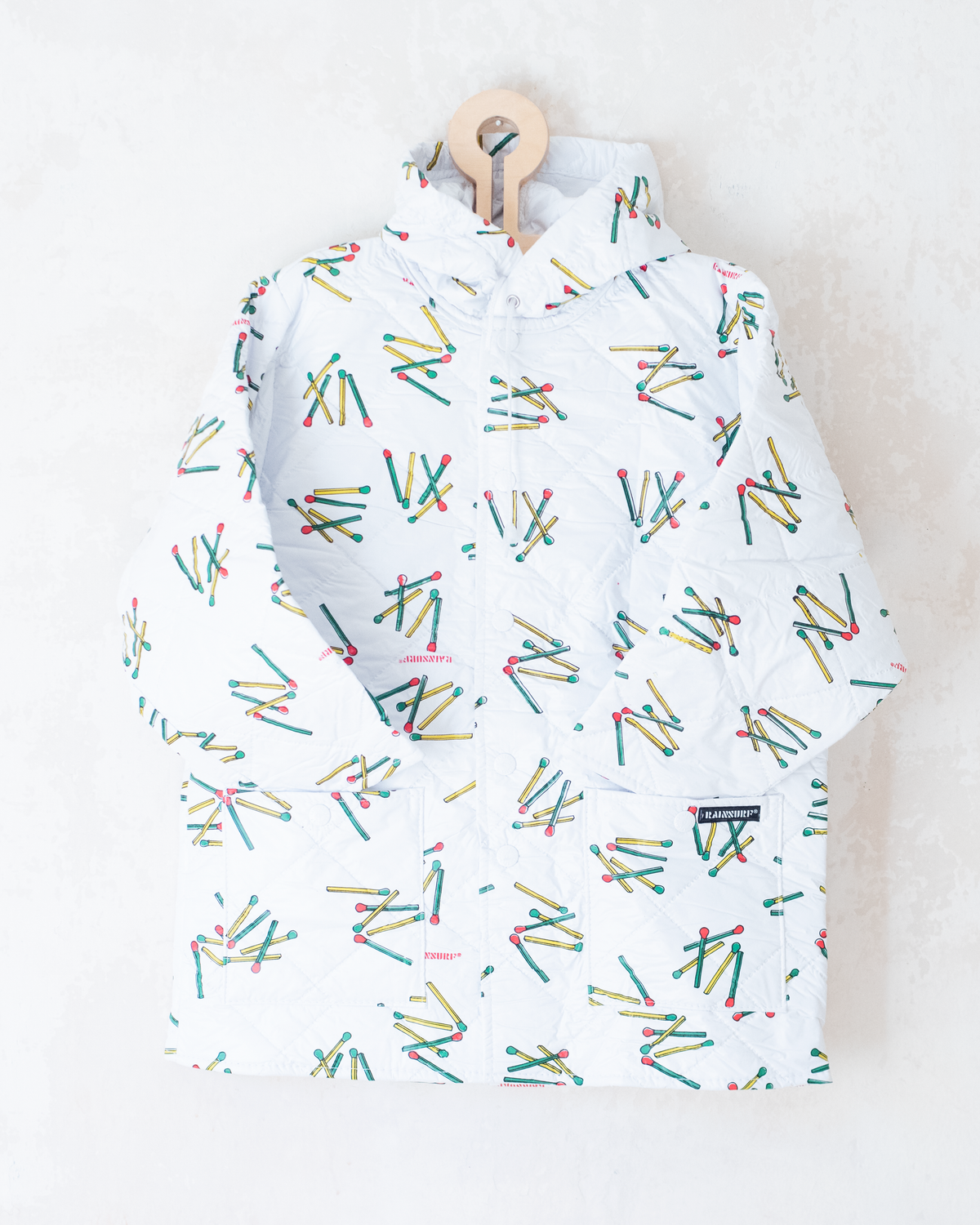White raincoat with matches | 7-8 years