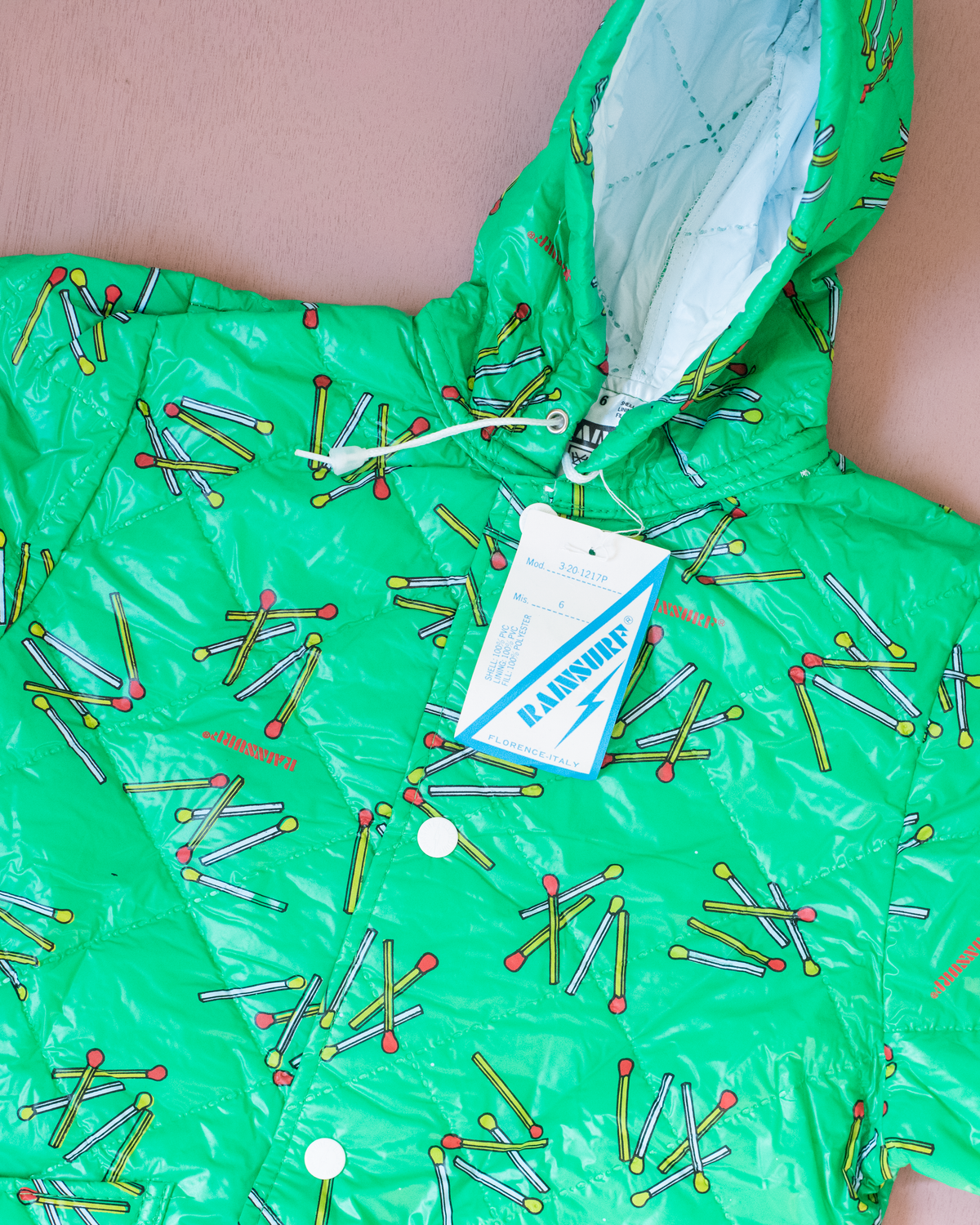 Green raincoat with matches | 6-7 years 