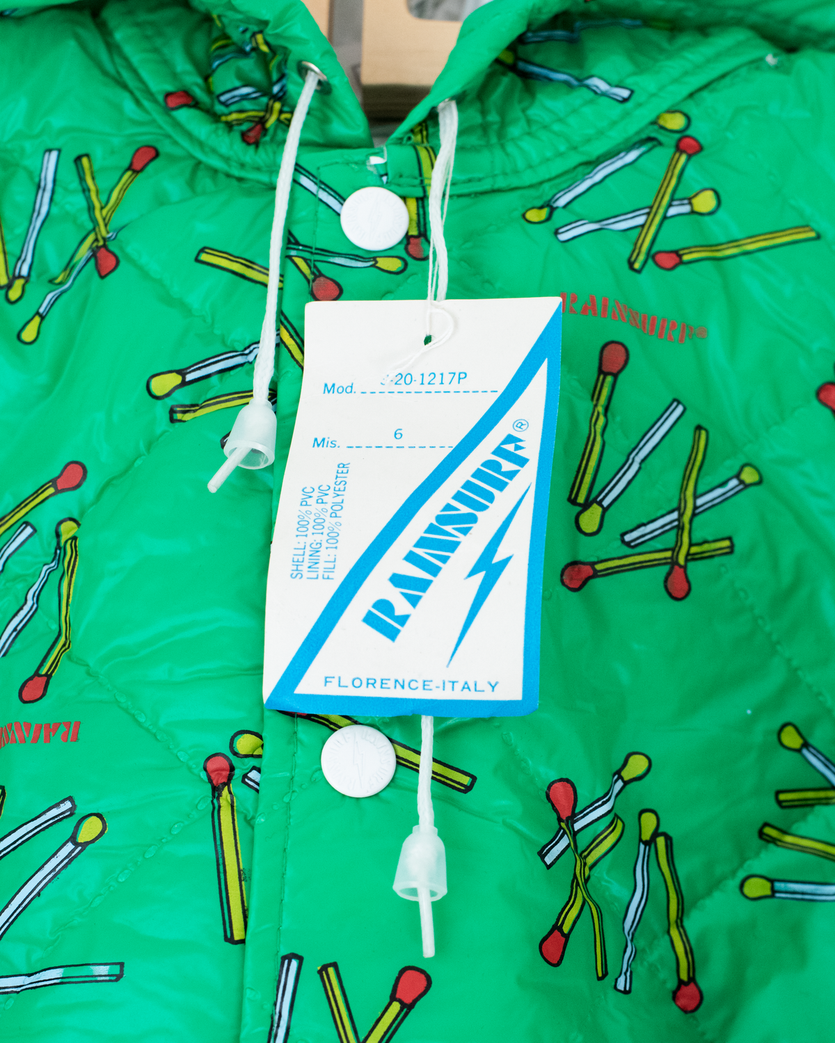 Green raincoat with matches | 6-7 years 