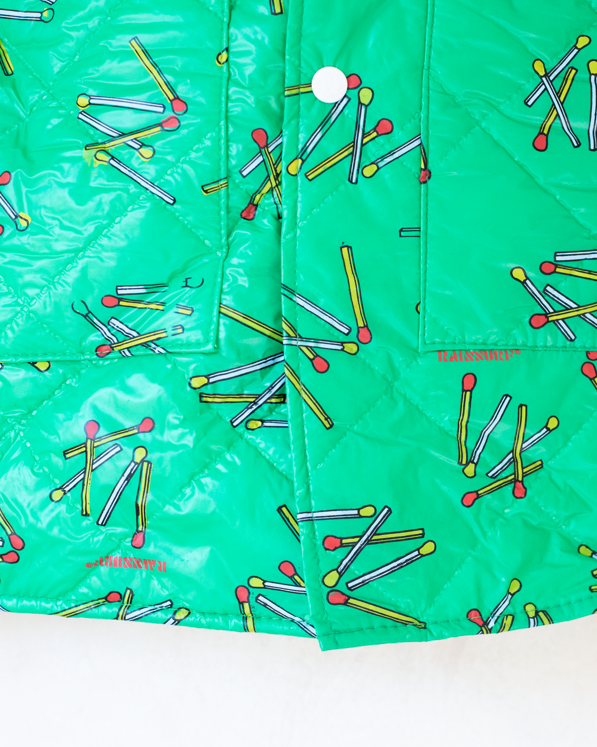Green raincoat with matches | 6-7 years 
