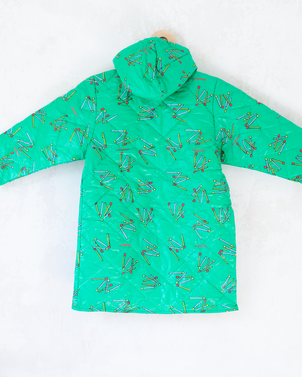 Green raincoat with matches | 6-7 years 
