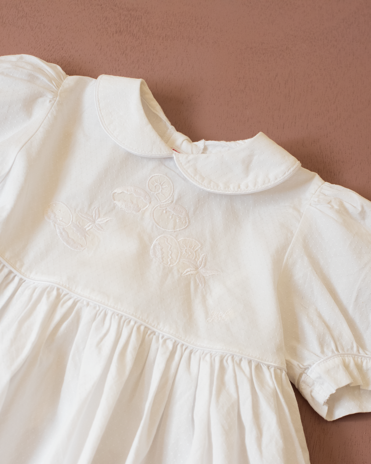 Yves Saint Laurent white dress with embroidered scallops | 12-18 months