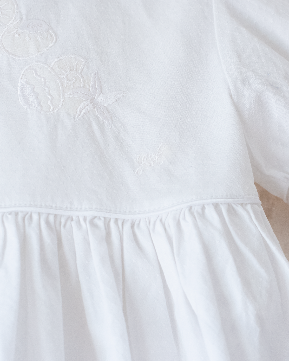 Yves Saint Laurent white dress with embroidered scallops | 12-18 months