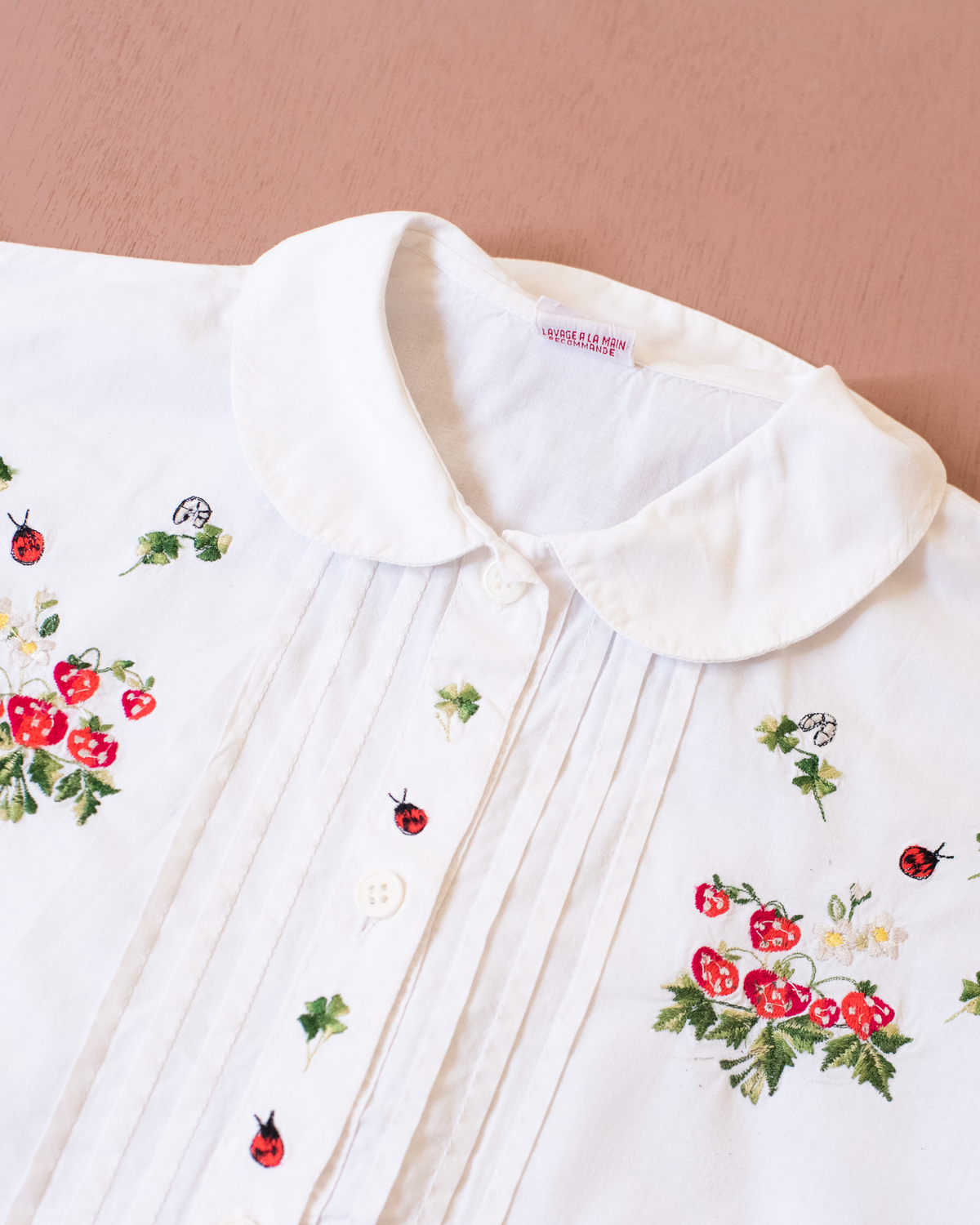 White shirt with strawberry and beetle embroidery | 6-7 years