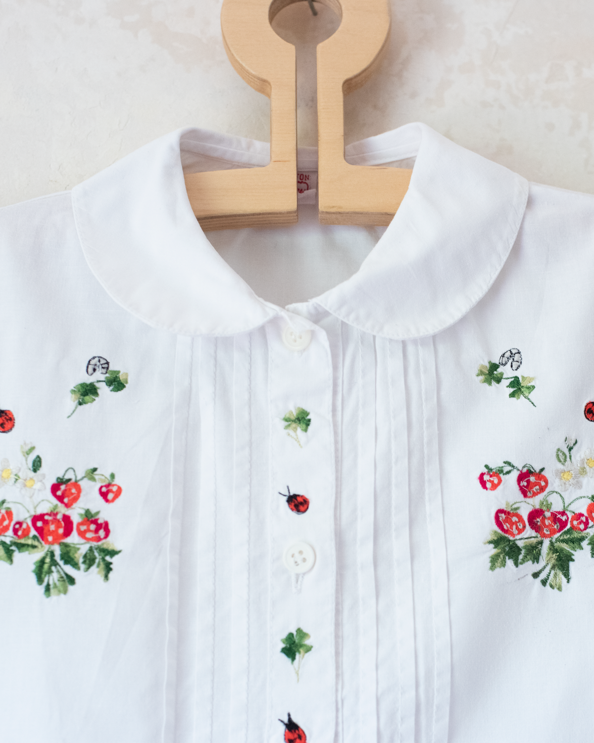White shirt with strawberry and beetle embroidery | 6-7 years