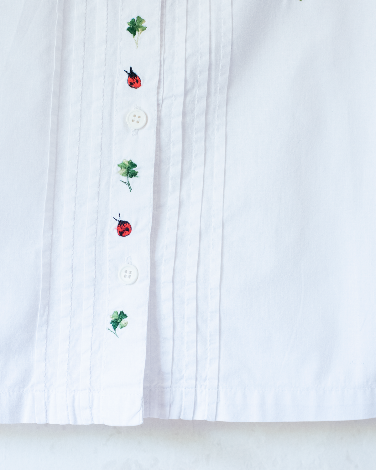 White shirt with strawberry and beetle embroidery | 6-7 years