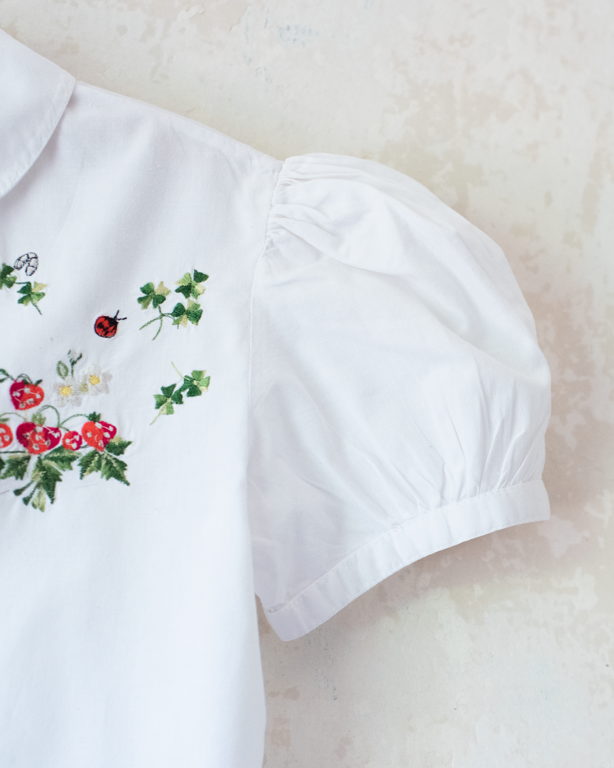 White shirt with strawberry and beetle embroidery | 6-7 years