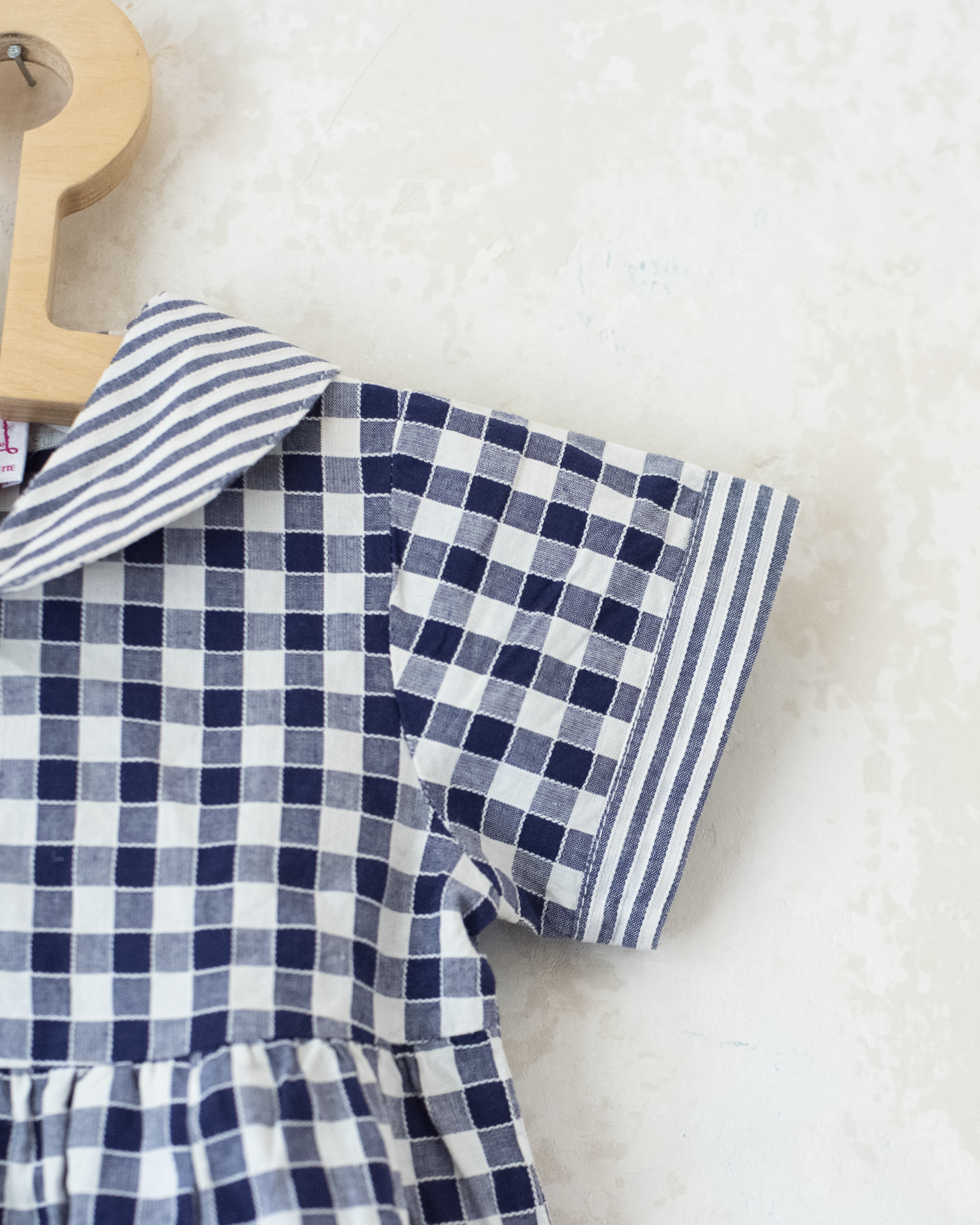 אוברול עם משבצות ופסים | 12-18 חודשים