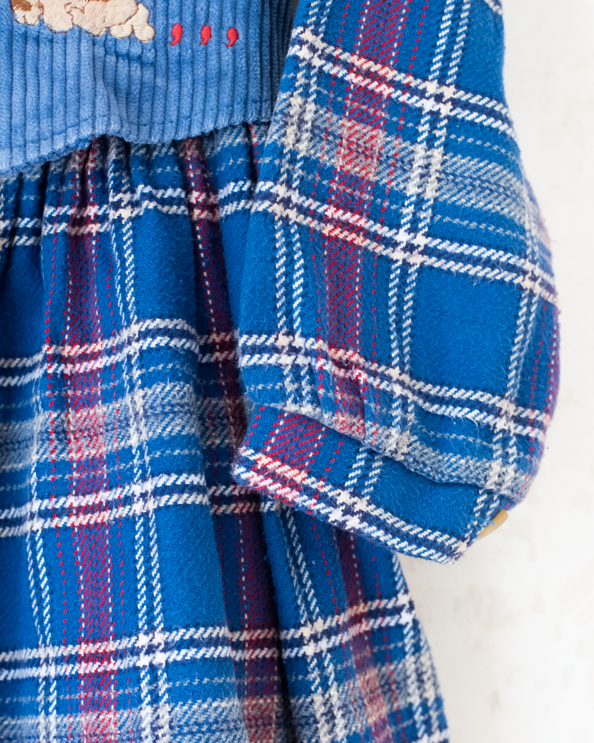 Blue plaid dress with embroidered dogs from Jacquard | 6-7 years