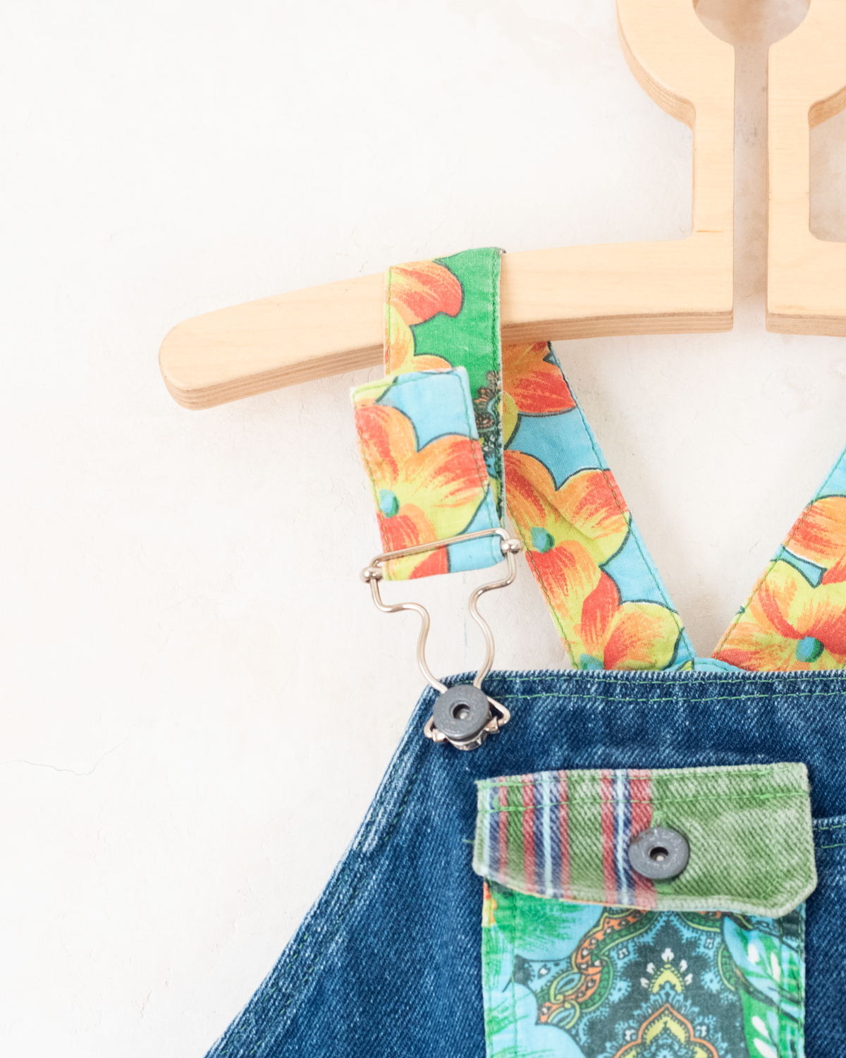 Denim overalls with colorful patches | 9-12 months