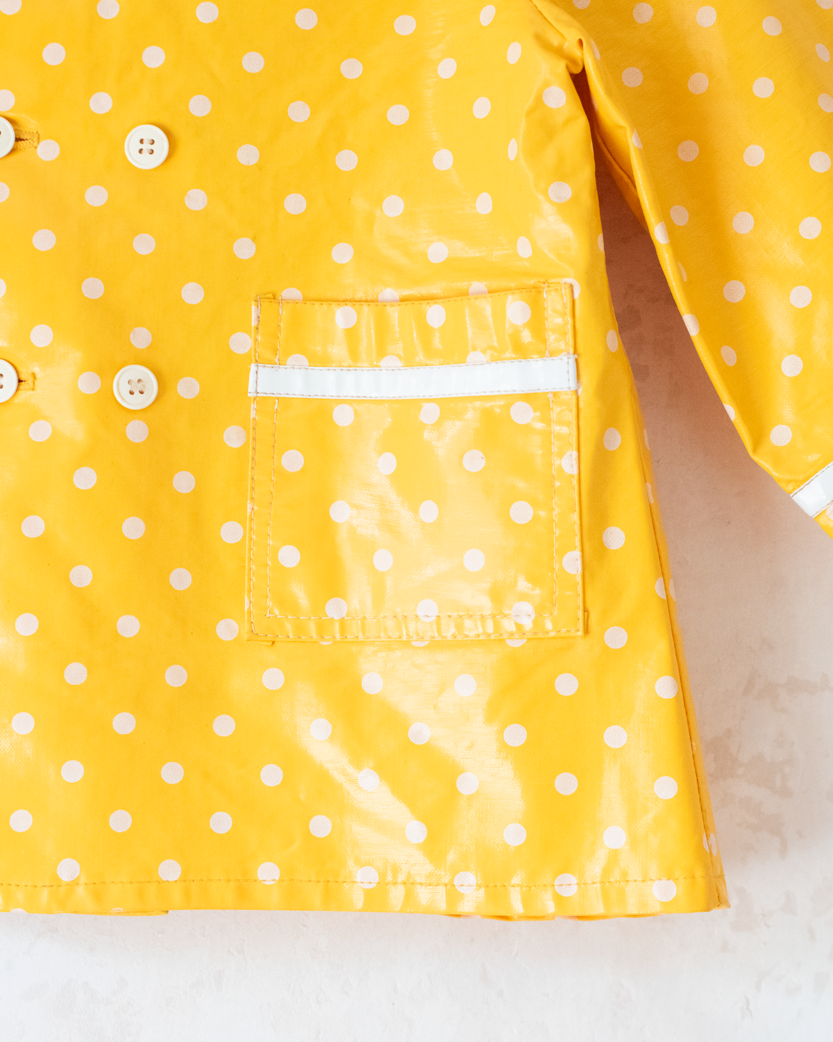 Yellow polka dot raincoat with hood | 2-3 years