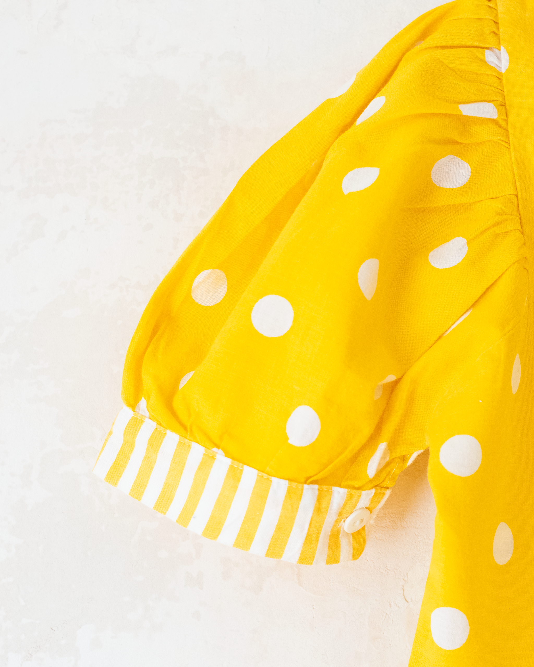 חולצת בטן צהובה עם פסים ונקודות | 10-11 שנים