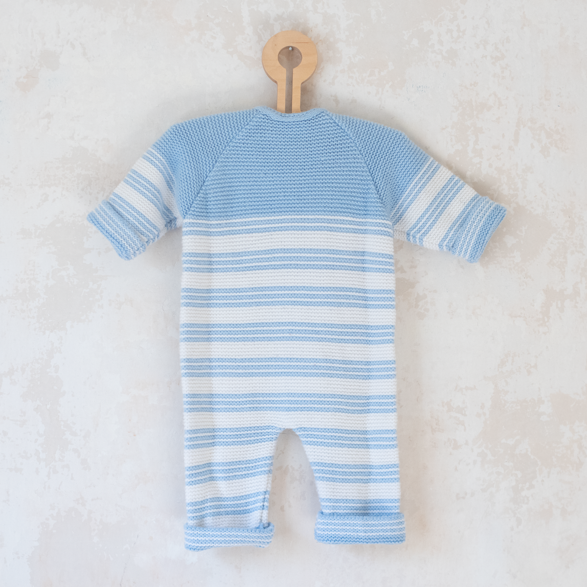 Knitted overalls in light blue and white | 6-9 months