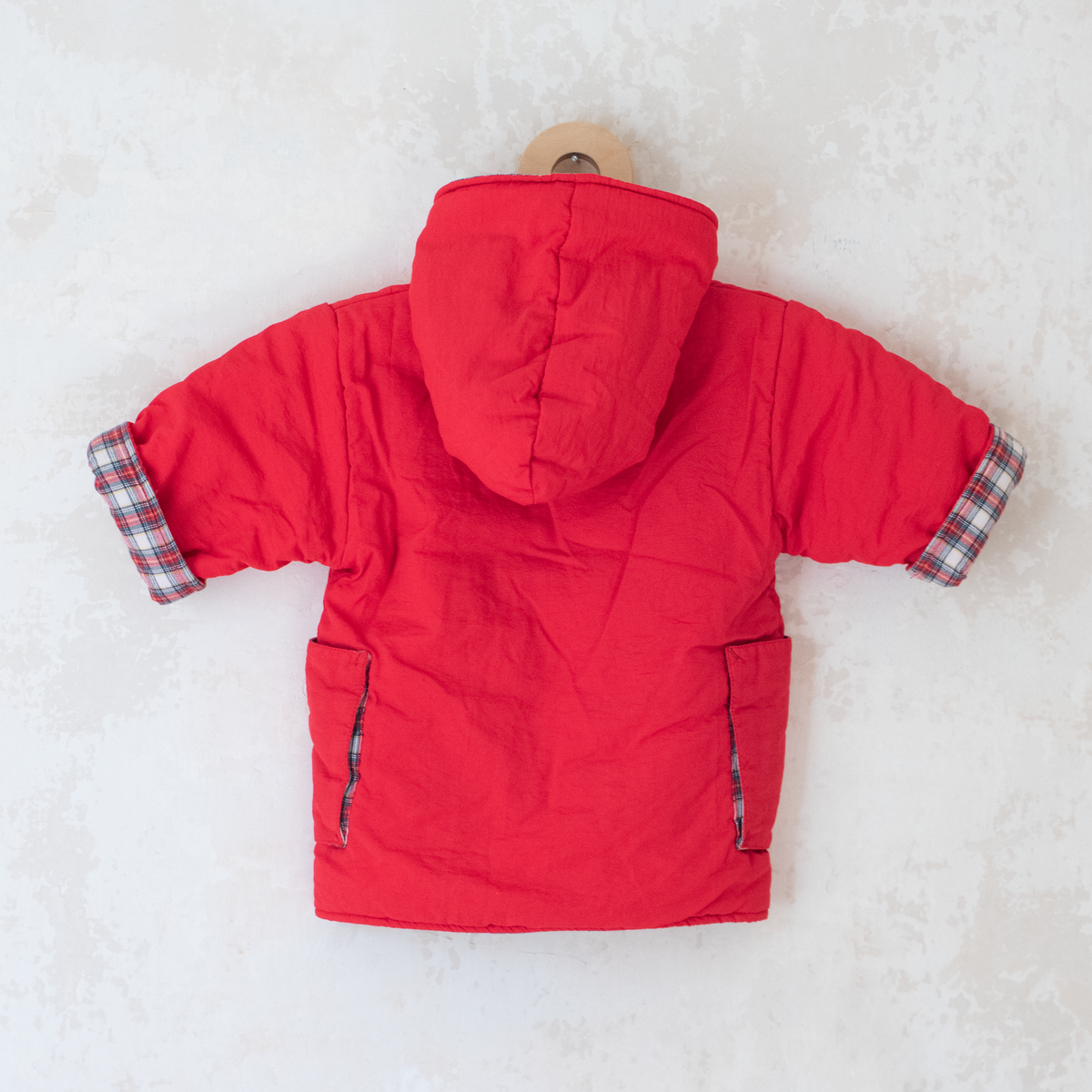 Red down jacket with checks from Yves Saint Laurent | 3-9 months