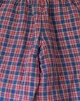 מכנסים משובצים באדום - oda-paam.com