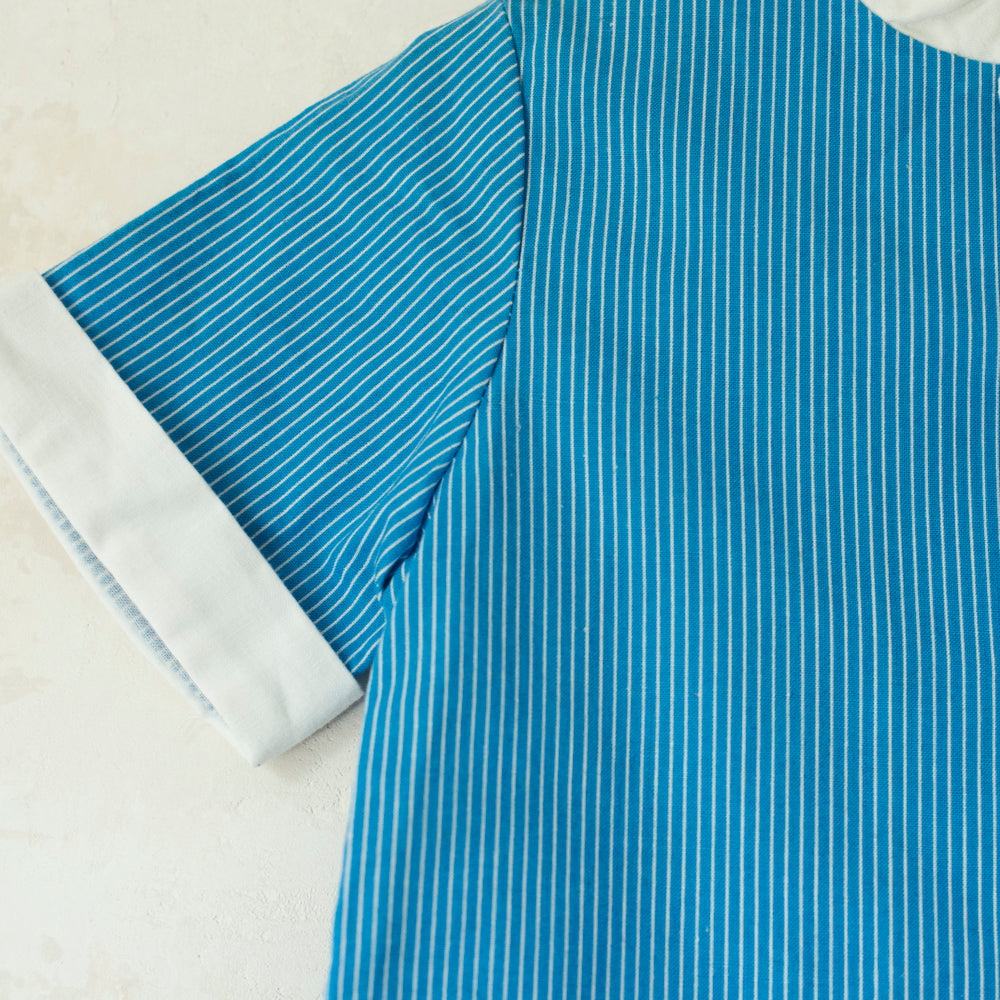 חולצת פסים כחולה עם כיס - oda-paam.com