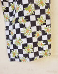 מכנס משבצות שחור לבן ופרחים - oda-paam.com