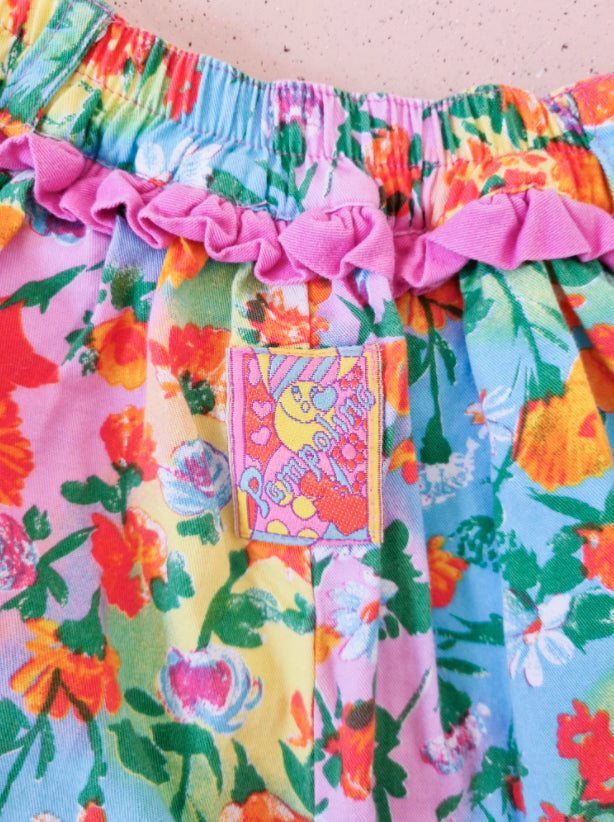 מכנסיים צבעוניים עם פרחים - oda-paam.com